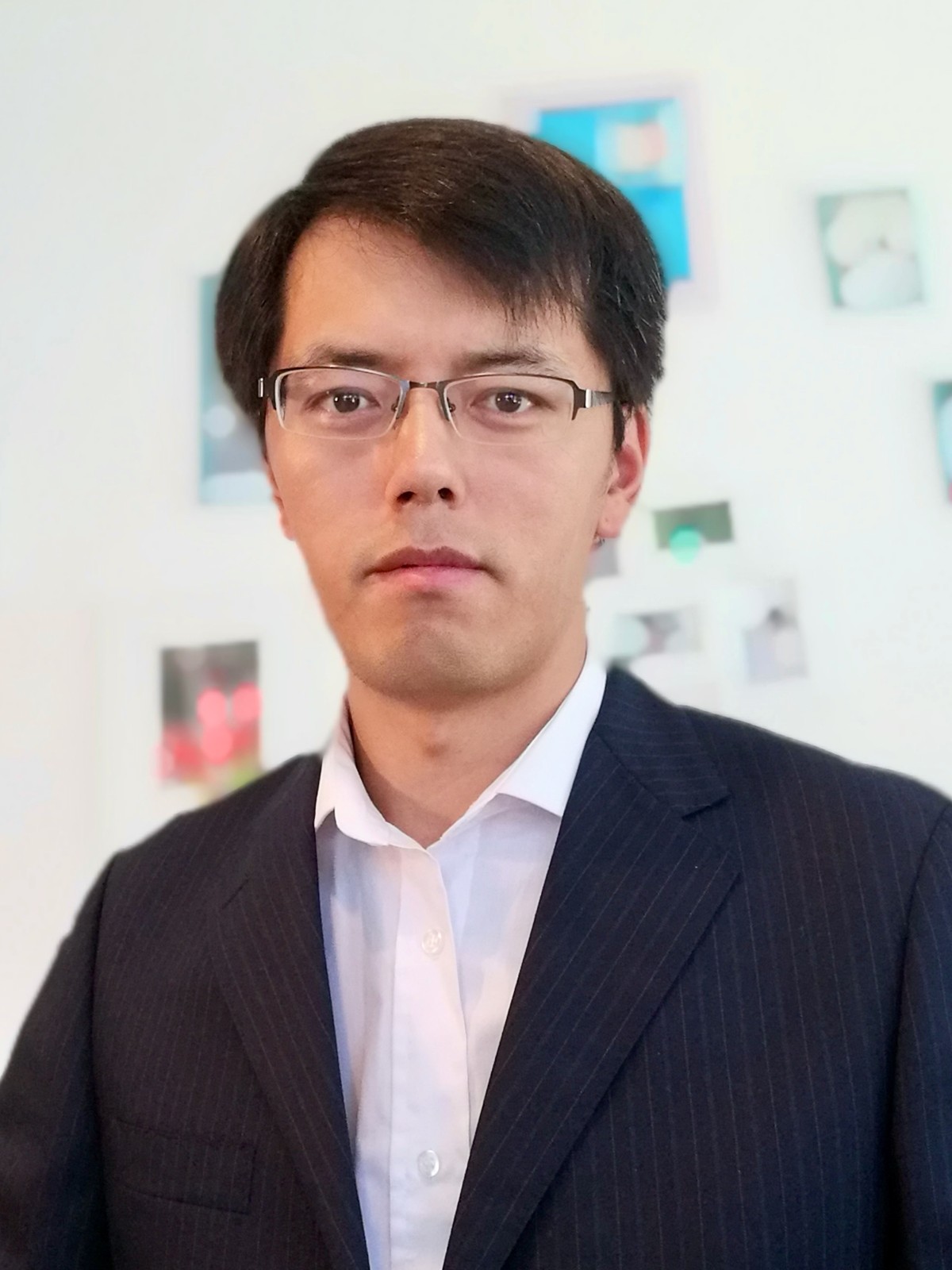 Dr.  Zhidong Zhang